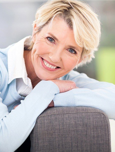 Smiling senior woman with AvaDent dentures