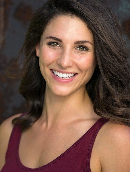 Woman with flawless healthy smile after gum reontouring