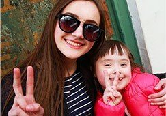 Smiling mother and daughter