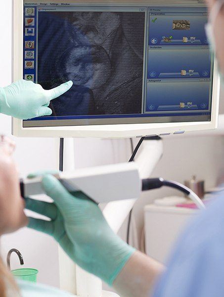 Intraoral photos on computer screen