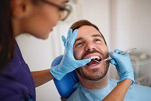 Patient receiving dental checkup