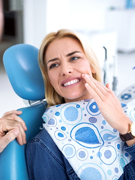Woman visiting dentist in West Monroe for root canal therapy
