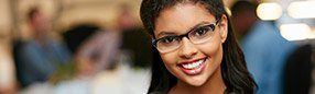 Young woman with gorgeous smile after cosmetic dentistry
